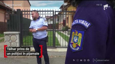 Uniforma în casă, iar poliţistul pe stradă, în pijamale. Un agent a sărit direct din pat pentru a salva o femeie