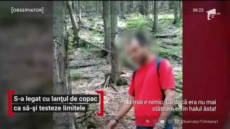 Un tânăr s-a legat cu lanțul de copac ca să-și testeze limitele