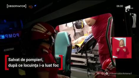 Salvat de pompieri, după ce locuința i-a luat foc