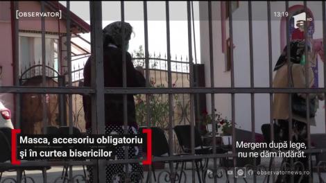 Masca, accesoriu obligatoriu și în curtea bisericilor