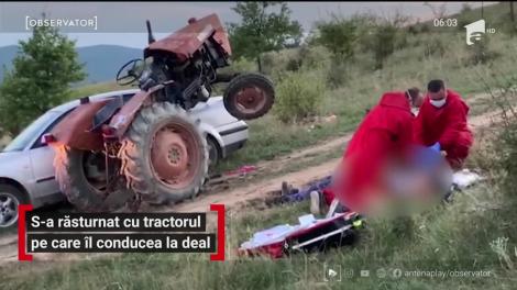 Sfârşit tragic. A vrut să urce cu tractorul la deal, însă vehiculul s-a răsturnat