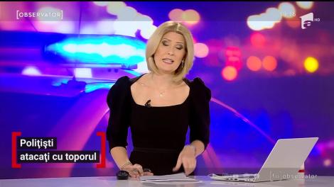 Polițiști atacați cu toporul în Capitală