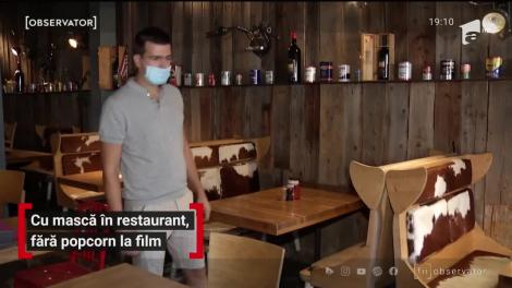 Cu masca în restaurant, fără popcorn la film
