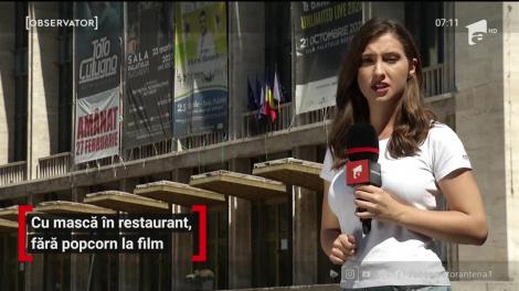 Cu mască în restaurant. fără popcorn la film