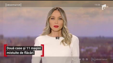 Două case şi 11 mașini mistuite de flacări