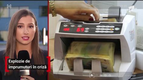 Explozie de împrumuturi în criză