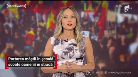 Purtarea măștii în școală scoate oamenii în stradă