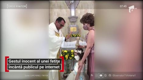 Reacţia inocentă a unei fetiţe în timpul unei ceremonii catolice a devenit viral de pe internet