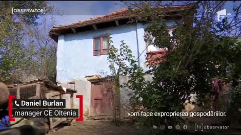 Sat șters de pe hartă de excavatoare