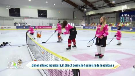Simona Halep încurajată de echipa de hochei care îi poartă numele