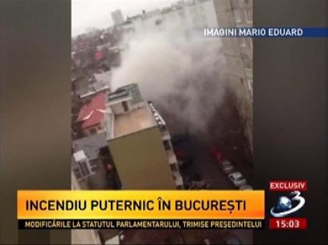 Imagini cu imobilul mistuit de flăcări din Bucureşti