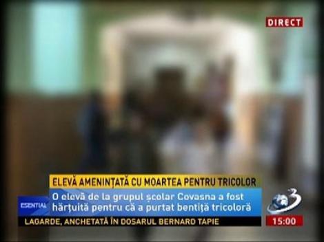 Elevă din Covasna, ameninţată cu moartea pentru că a purtat o bentiţă tricoloră