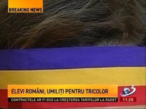 Elevi români, umiliţi pentru tricolor