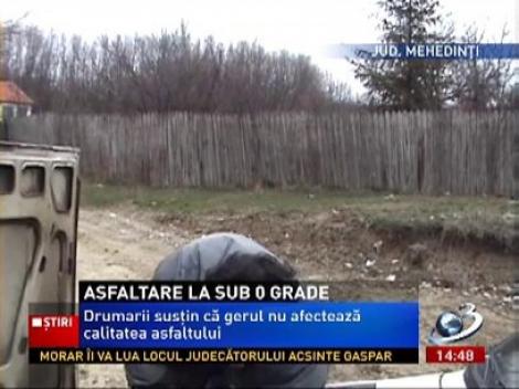 Bătaie de joc pe bani publici în judeţul Mehedinţi! Drum Naţional asfaltat la sub 0 grade
