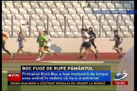 Emil Boc fuge de rupe pământul! A alergat 6 km în mai puţin de 35 de minute