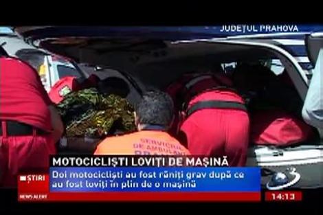 Doi motociclişti au fost răniţi grav dipă ce o maşină le-a tăiat calea. Unul dintre ei este în comă