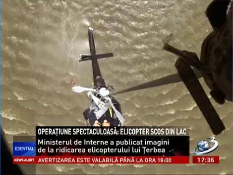Imagini de la ridicarea epavei elicopterului prăbuşit în Mureş
