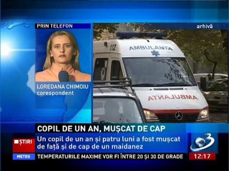 Copil de un an, muşcat de cap