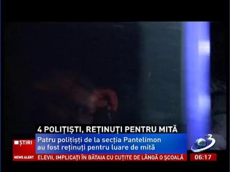 Patru poliţişti de la secţia Pantelimon au fost reţinuţi pentru luare de mită