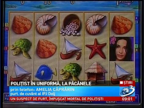 În uniformă, la păcănele! Poliţist din Dolj, client fidel la o sală de jocuri din Craiova