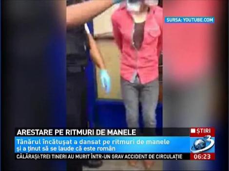 Un rom dansează pe manele în timp ce poliţiştii londonezi îi pun cătuşele la mâini., lăudându-se că este român