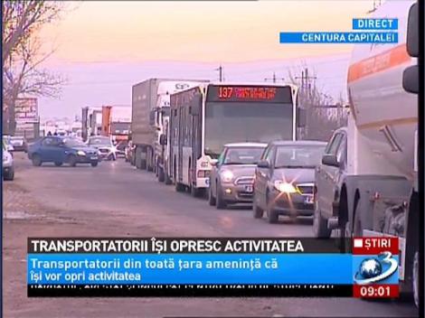 Transportatorii din toată ţara ameninţă că îşi vor opri activitatea