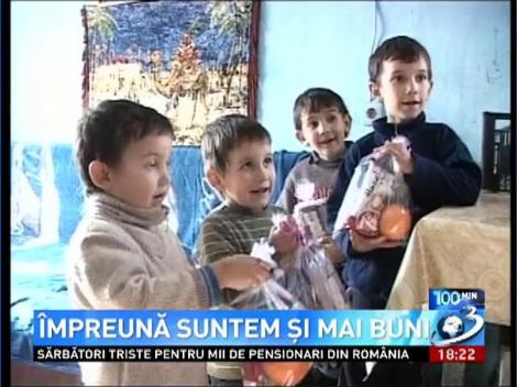 5 copii care nu au lumină și riscă să rămână fără casă au primit de Crăciun multe bucurii
