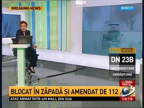 Uluitor! Blocat in zapada si amendat de 112
