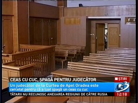 Ceas cu cuc, spaga pentru judecator