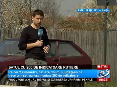 Satul cu 200 de indicatoare rutiere