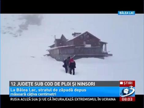 12 judeţe sub cod de ploi şi ninsoare