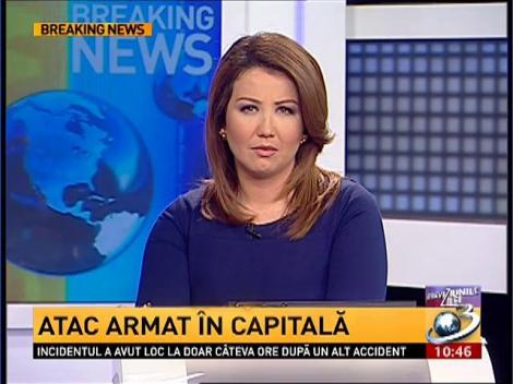 Atac armat în Capitală. Vânzătoare, ameninţată de un bărbat