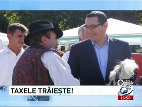 Deziluzia Optică: Taxele trăieşte!