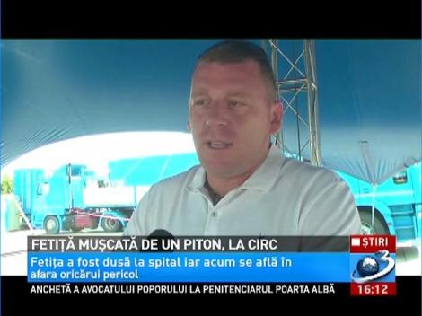 Fetita, muscata de un piton la circ