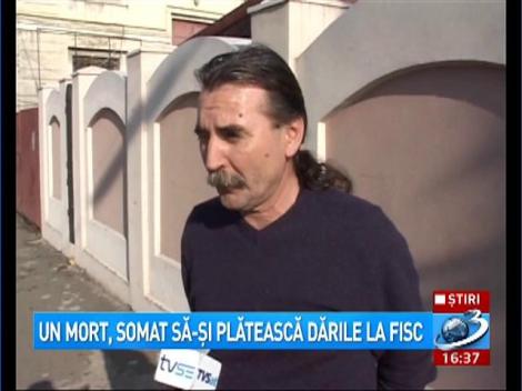 Un mort, somat sa-si plateasca darile la Fisc