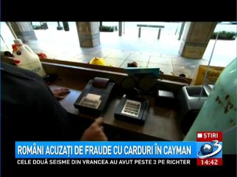Rom&acirc;ni acuzaţi de fraude cu carduri &icirc;n Cayman