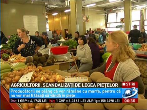 Agricultorii, scandalizaţi de legea pieţelor