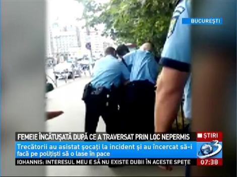 Femeie încătuşată după ce a traversat prin loc nepermis