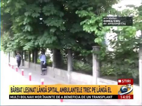 Bărbat leşinat l&acirc;ngă spital, ambulanţele trec pe l&acirc;ngă el