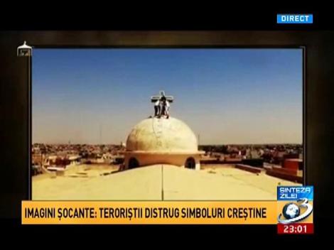 Imagini şocante: Teroriştii distrug simboluri creştine