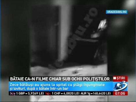 Bătaie ca-n filme chiar sub ochii poliţiştilor