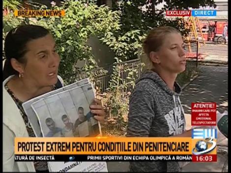Protest extrem &icirc;n Capitală. Două femei s-au urcat pe un bloc din București și reclamă condițiile din penitenciare