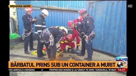 Bărbatul prins sub un container a murit