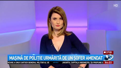 Mașină de poliție urmărită de un șofer amendat