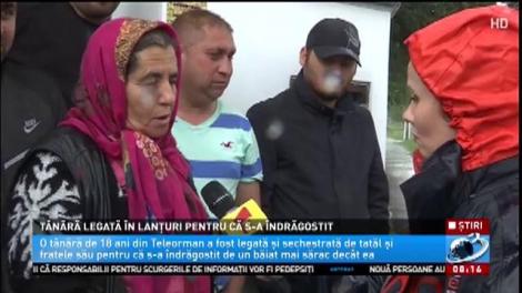 T&acirc;nără legată &icirc;n lanțuri pentru că s-a &icirc;ndrăgostit! Tatăl și fratele fetei au sechestrat-o și au tuns-o, ca să-i dea o lecție