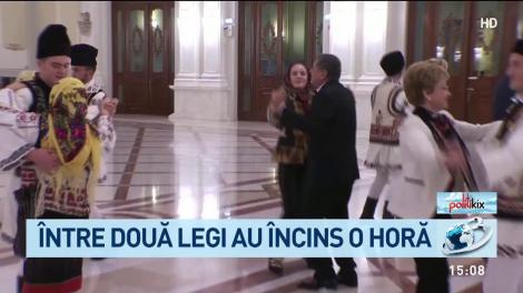 &Icirc;ntre două legi au &icirc;ncins o horă