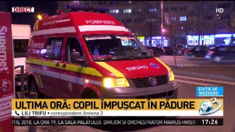 Copil &icirc;mpușcat &icirc;n pădure