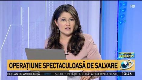Imagini șocante: Femeie care amenința cu sinuciderea, salvată de pompieri