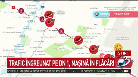 Trafic &icirc;ngreunat pe DN1, mașină &icirc;n flăcări