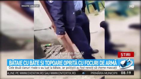 Bătaie cu b&acirc;te și topoare oprită cu focuri de armă